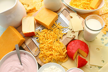 a variety of dairy products, including yogurt, milk, and cheeses