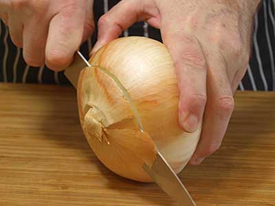 Slice the stem and base off the onion.