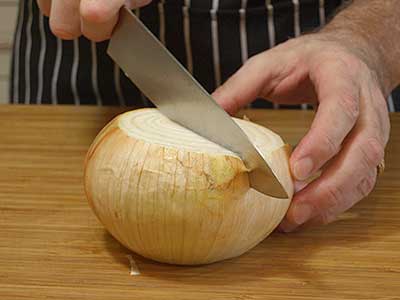 Slice the onion in half lengthwise.