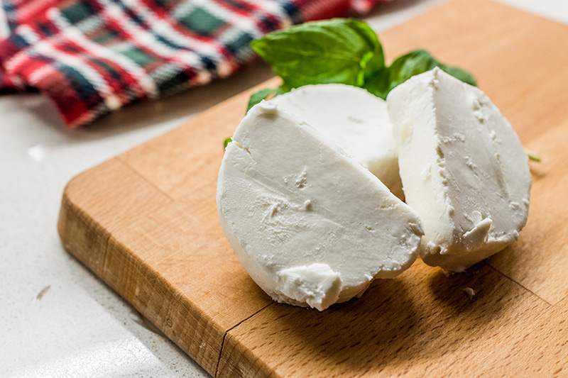 goat cheese drizzled with olive oil - an appetizer