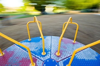 a view from the center of a moving merry-go-round