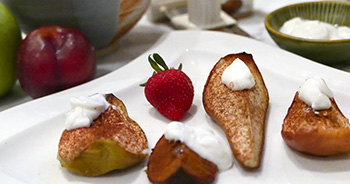 roasted pears, apples, and plums garnished with a honey yogurt sauce