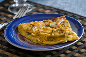 a freshly-made cheese and herb omelet