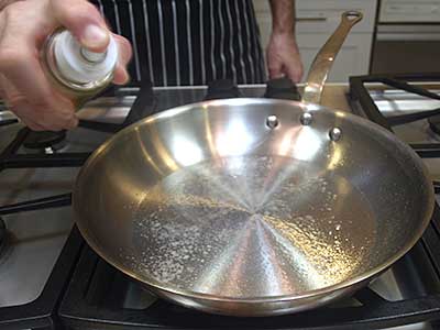 Place a large skillet over medium-high heat and spray with oil.