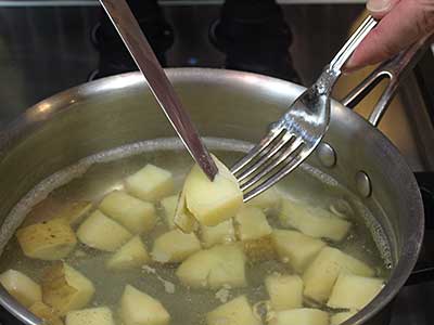 Cook the potatoes for about 15 to 20 minutes until soft. A knife should slide into the potato easily.