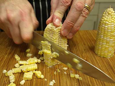 cut the kernels from the cob.