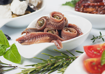 an appetizer of anchovy filets