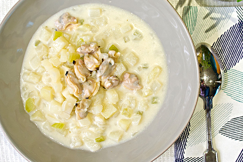 Clam Chowder, a soup with shellfish, vegetables, and dairy