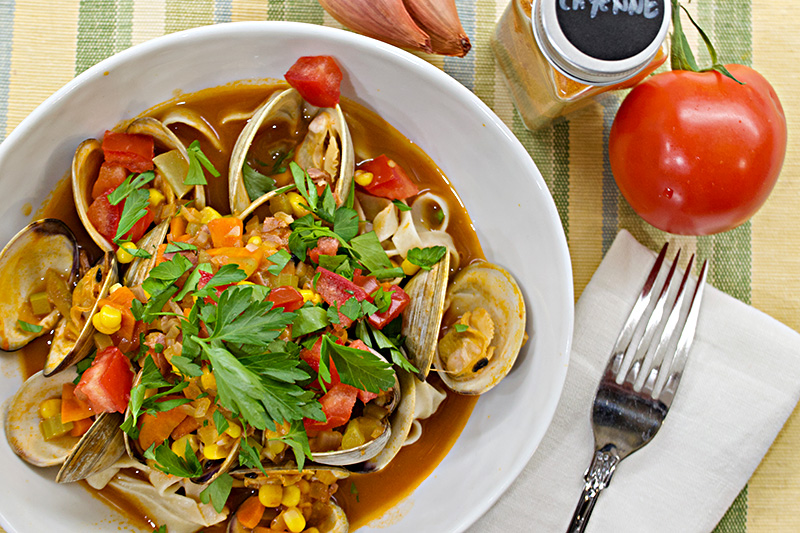 Steamed Clams with Spicy Tomato Corn Broth and Fettuccine