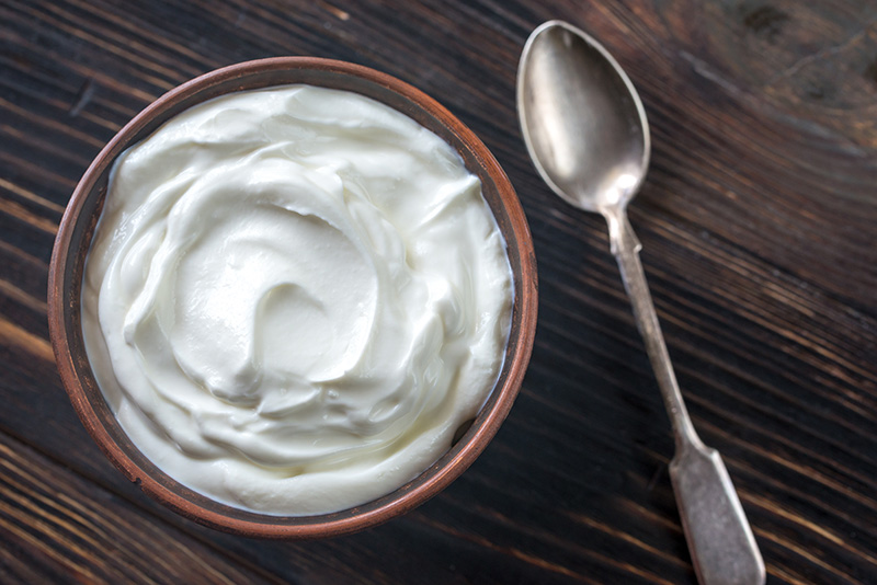 a bowl of yogurt, which contains probiotics