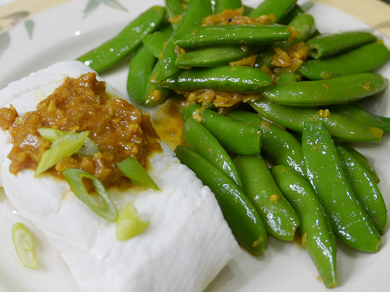 Halibut with Curry Butter and Snap Peas recipe from Dr. Gourmet