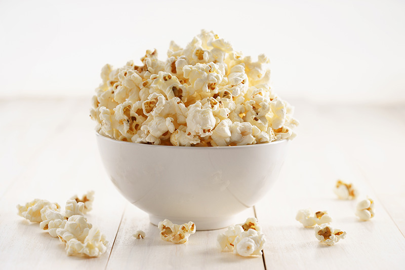 popcorn in a white ceramic bowl