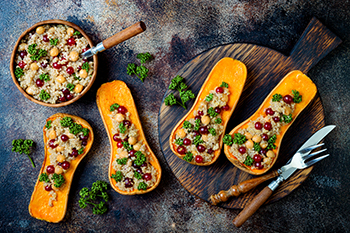 Butternut squash stuffed with chickpeas, quinoa, and cranberries