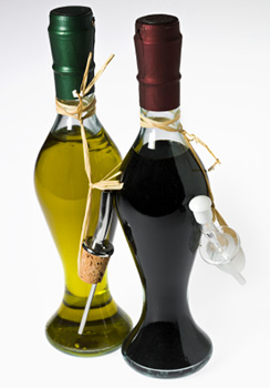 a bottle of oil and a bottle of vinegar